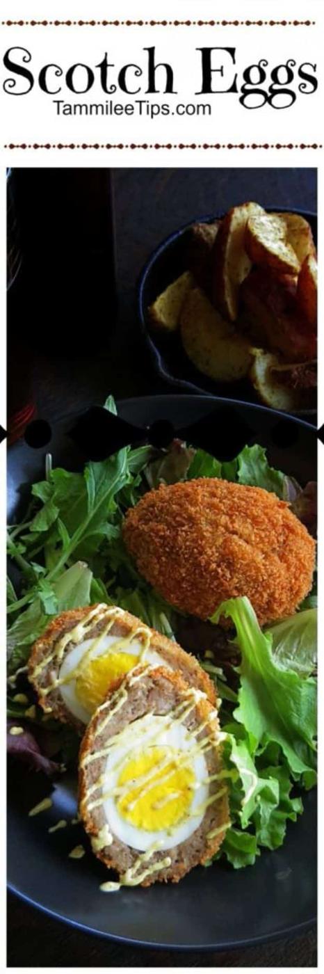 Scotch eggs cut in half to show the soft yolk inside a sausage layer and a crisp golden panko coating