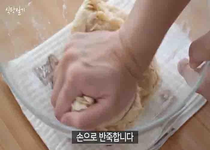Kneading the honey bread dough