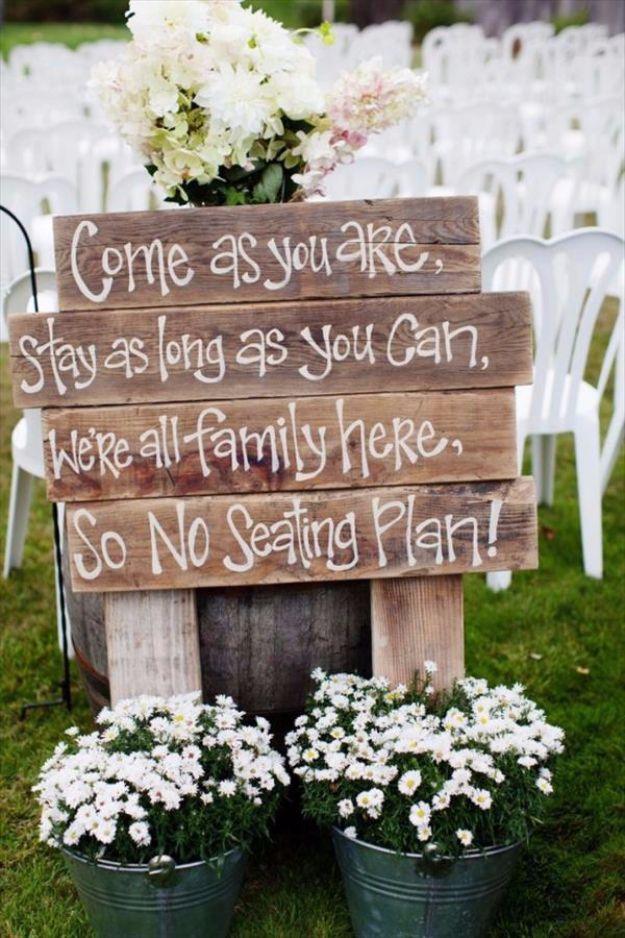 Outdoor Pallet Wedding Sign DIY, low effort once the supplies are laid out and charm that photographs better than it costs