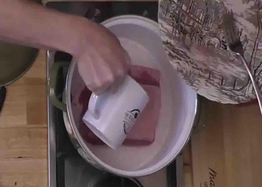 Adding water to the corned beef
