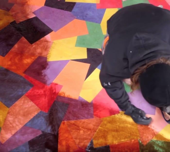 Make a colored paper floor with construction paper from the craft store