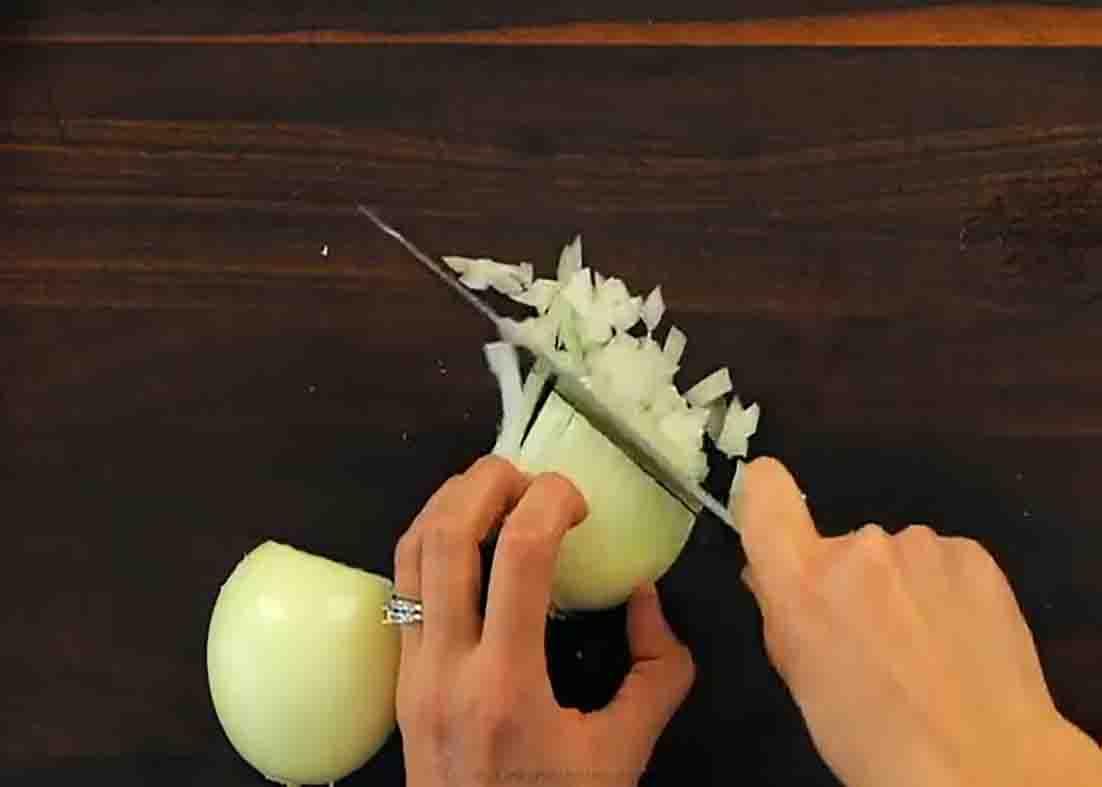 Chopping the onions for the instant pot chicken and rice