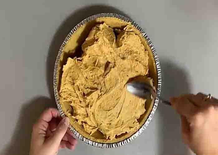 Assembling the turtle pumpkin pie dessert