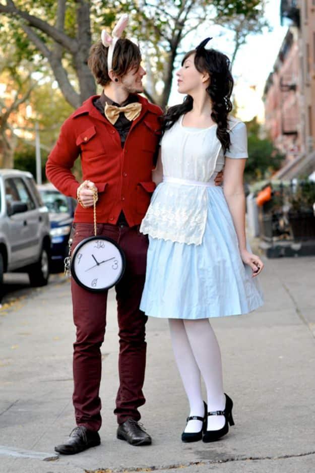Alice and the White Rabbit couples costume with a pale blue dress, white pinafore, red jacket and rabbit ears