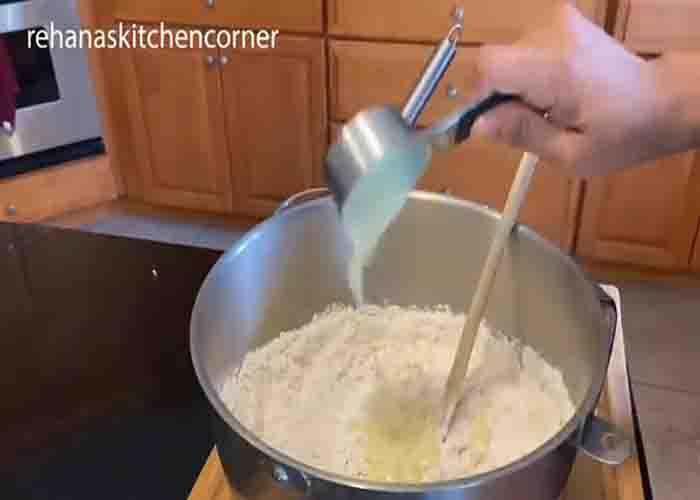 Making the cloverleaf bread batter