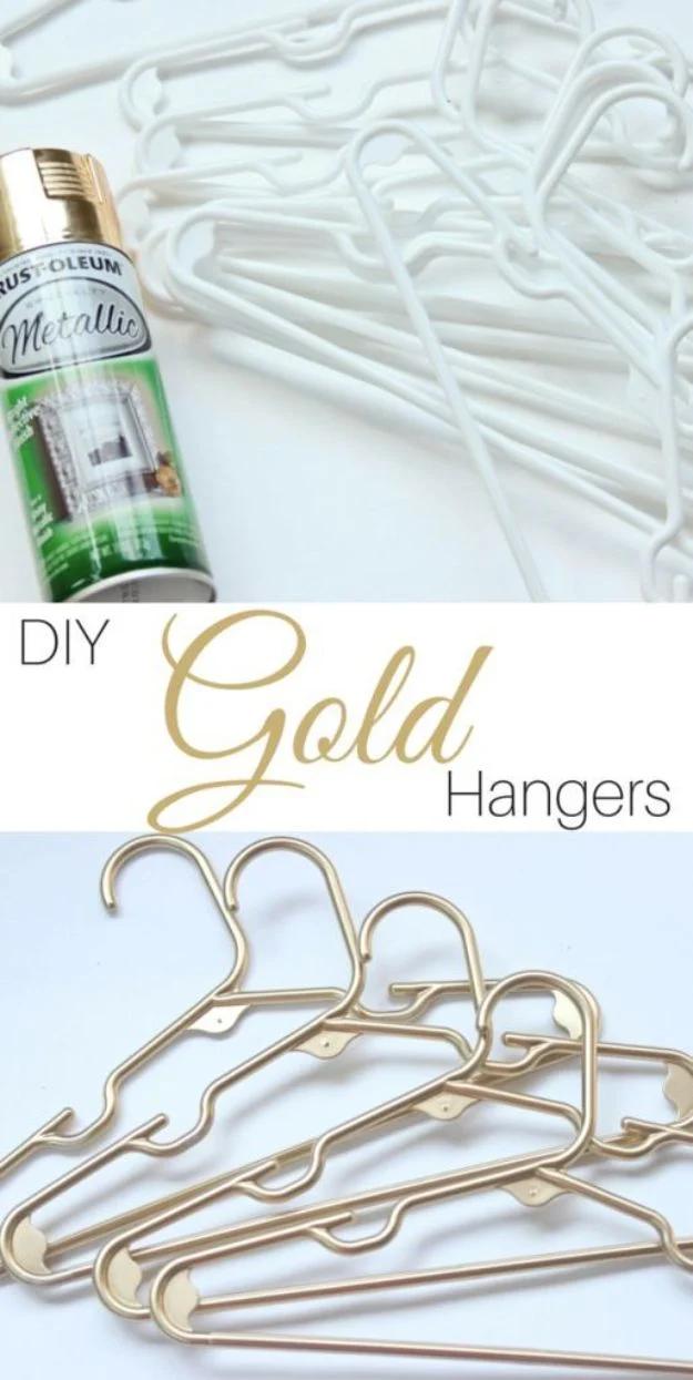 Painting hack for closets, white plastic hangers beside a can of Rust-Oleum metallic and the finished gold hangers