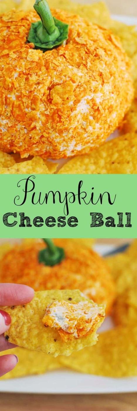 Pumpkin shaped cheese ball rolled in crumbled Doritos with a green bell pepper stem, surrounded by chips