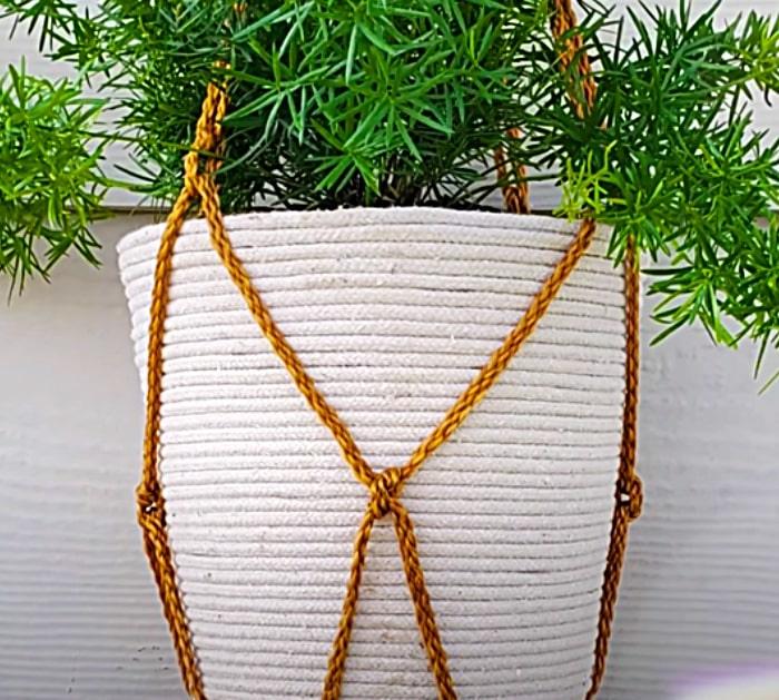 Make A Planter Out Of A Plastic Wastebasket And Clothesline Rope