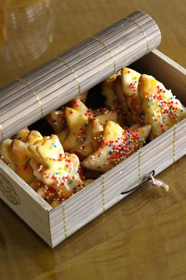 Befanini, Italian Epiphany shortbread cookies cut into shapes and covered in small multicolored sprinkles