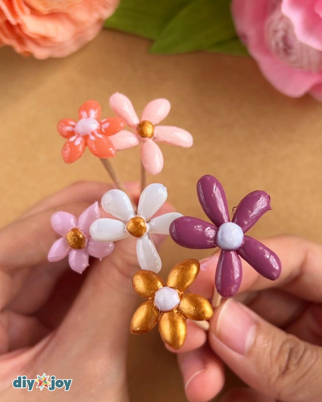 Homemade Hot Glue Flowers — painting the flowers and leaves