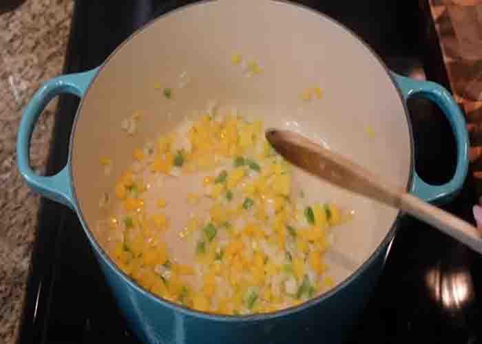 Sauteing the bell pepper and onion for the white chicken chili