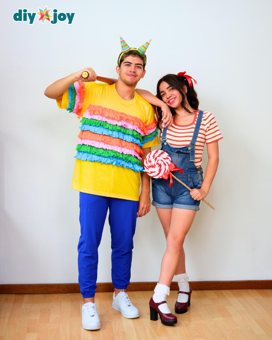 DIY Costumes - the pinata guy resting his arm on the candy girl's shoulder, holding the swirl lollipop prop like a bat