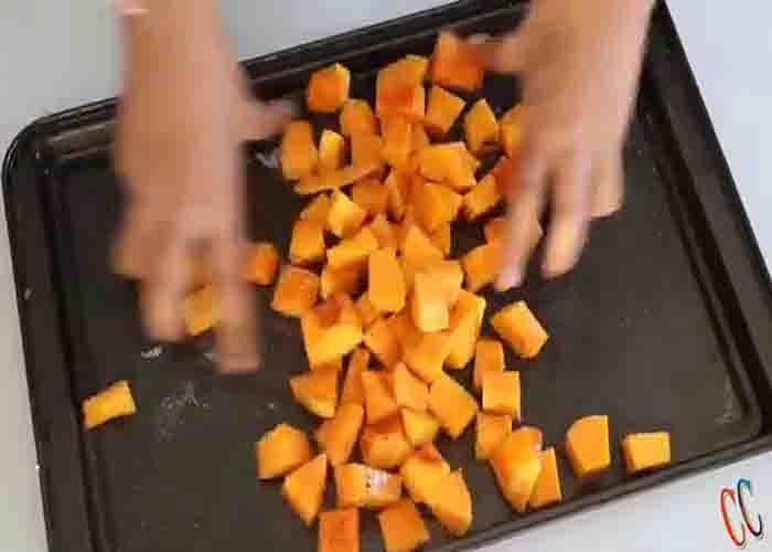 Roasting the butternut squash for the Fall salad recipe