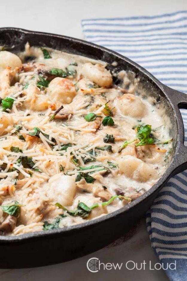 One pot gnocchi with chicken and spinach in a creamy cheese sauce, cooked in a single skillet for an easy weeknight dinner
