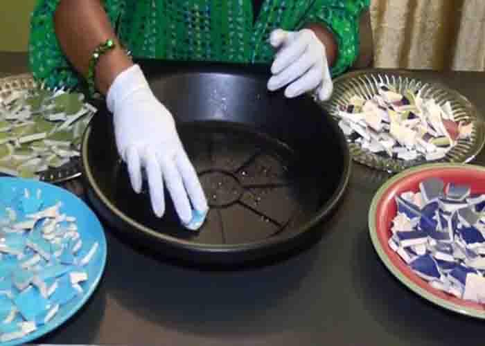 Prepping the saucer to make the DIY mosaic bird bath