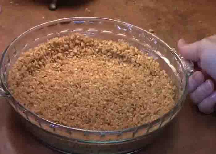 Making the drumstick ice cream pie crust