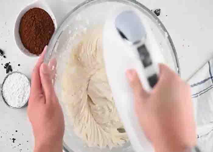 Making the marshmallow frosting for the extreme Oreo cake