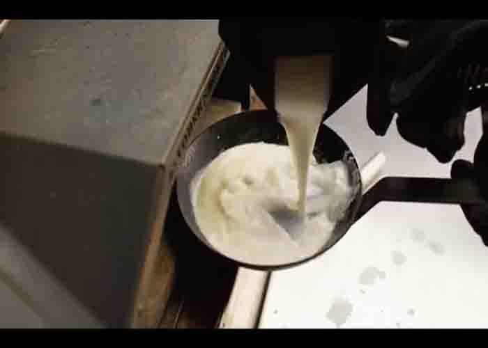 Making the mornay sauce for the Kentucky hot brown recipe