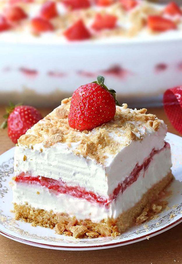 No bake strawberry cheesecake lasagna layered with graham crust, cream cheese and fresh strawberries