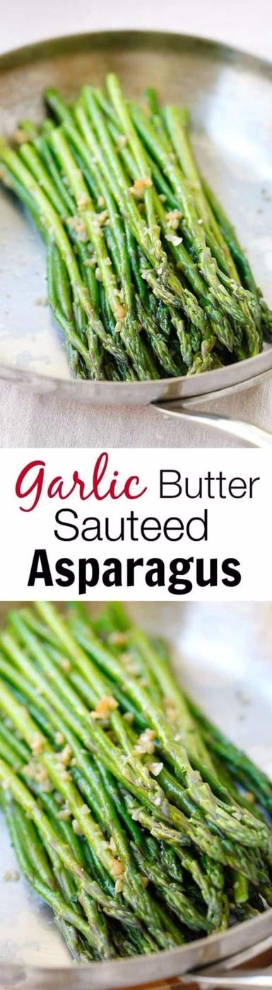 Garlic butter sauteed asparagus, whole bright green spears with minced garlic on an oval silver platter