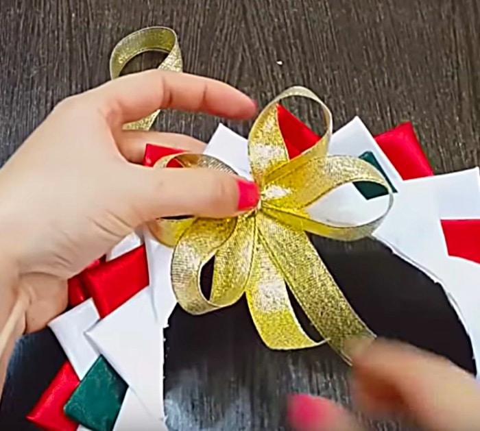 Learn to make this cheap easy DIY Satin Mini Wreath from polystyrene plates