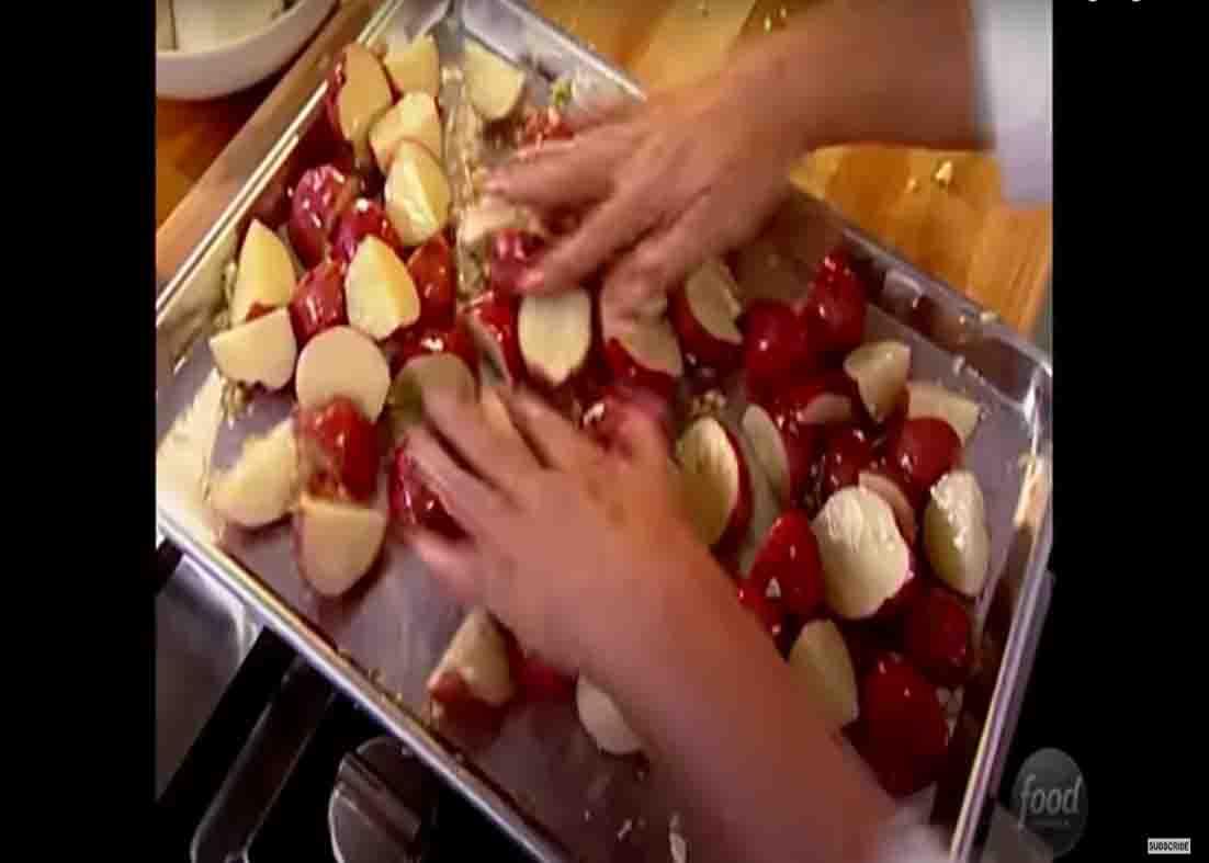 Seasoning the potatoes before roasting them