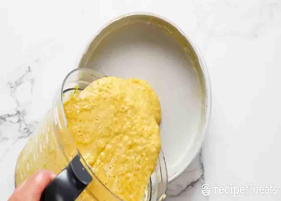 Pouring the orange cake mixture to the cake mold