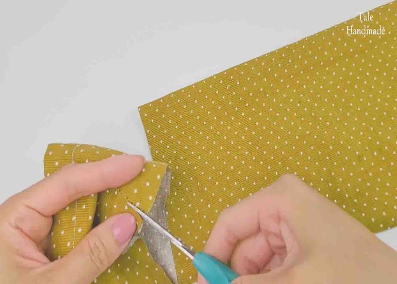 Cutting the sleeve hem to attach a lace