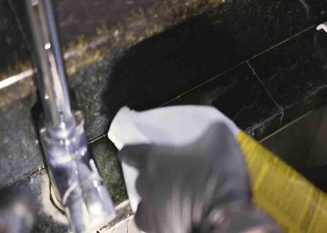 Pouring a good amount of CLR to the granite