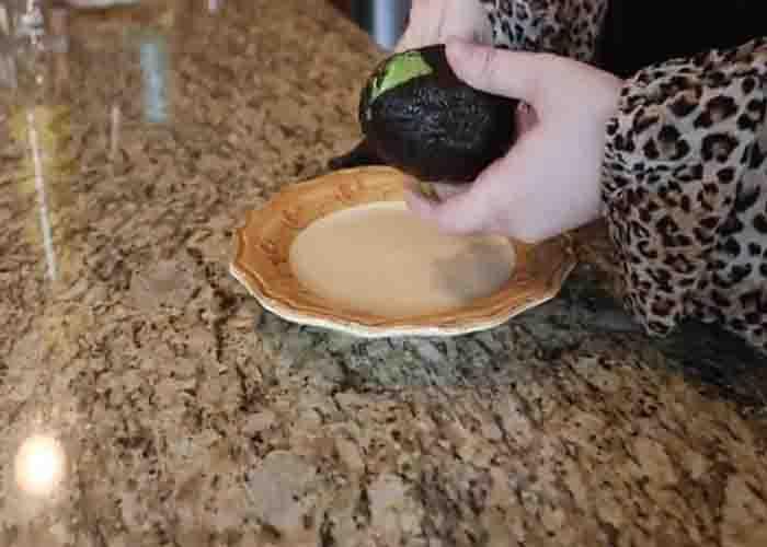 Peeling the frozen avocado