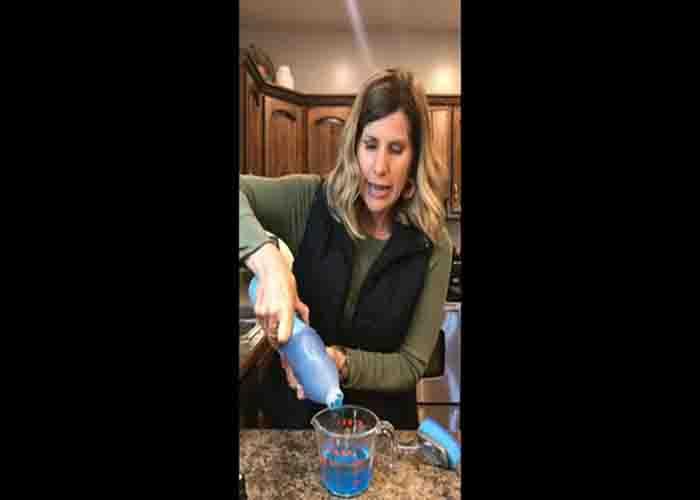 Mixing dawn dishwashing soap and white vinegar to make a diy miracle cleaner for shower