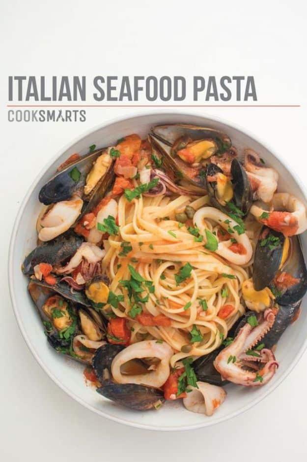 Italian seafood pasta with mussels and calamari tossed with spaghetti in a light white wine and tomato sauce