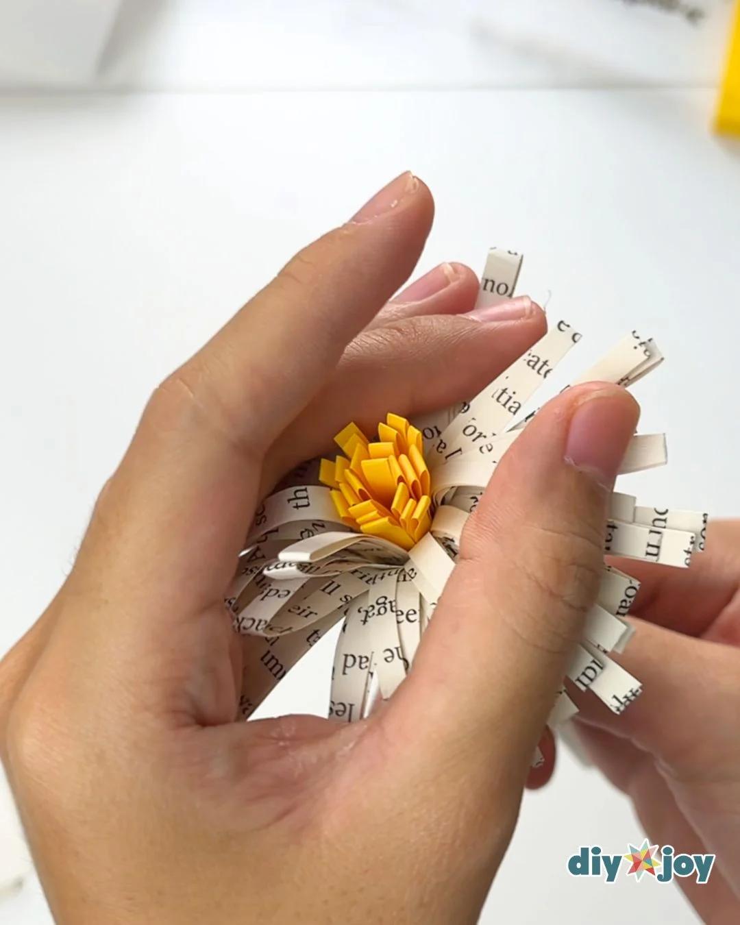 Book Page Paper Flower — pressing down the petals