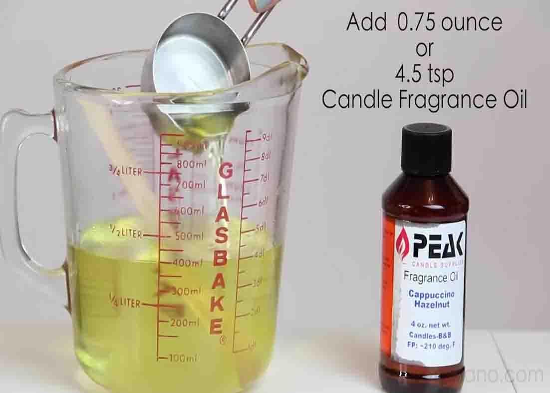 Adding fragrance oil to the DIY Starbucks candle mixture