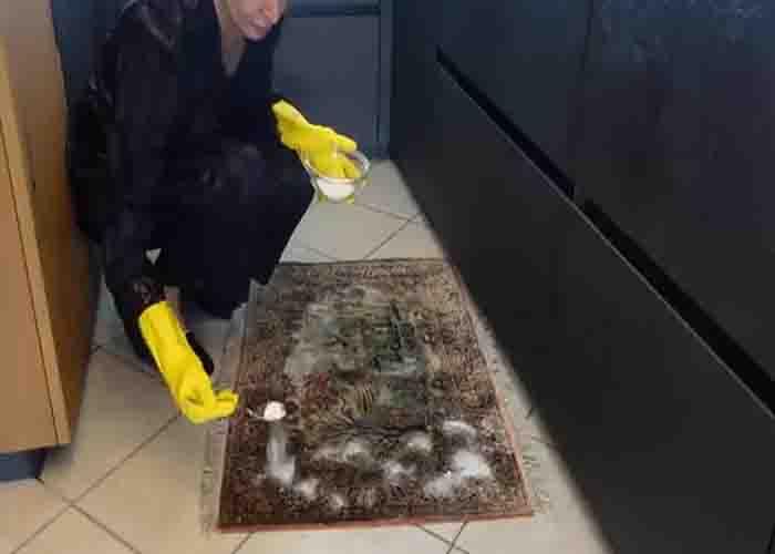 Sprinkling some salt and baking soda over the dirty carpet