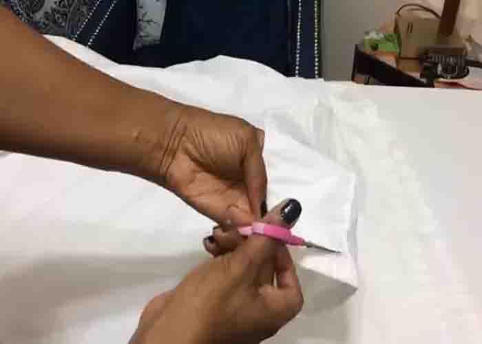 Cutting the sheets to make it a curtain