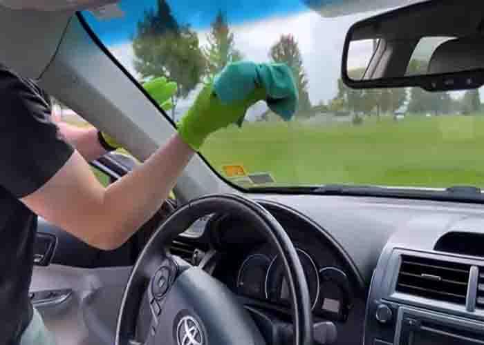 Wiping the windshield clean and dry