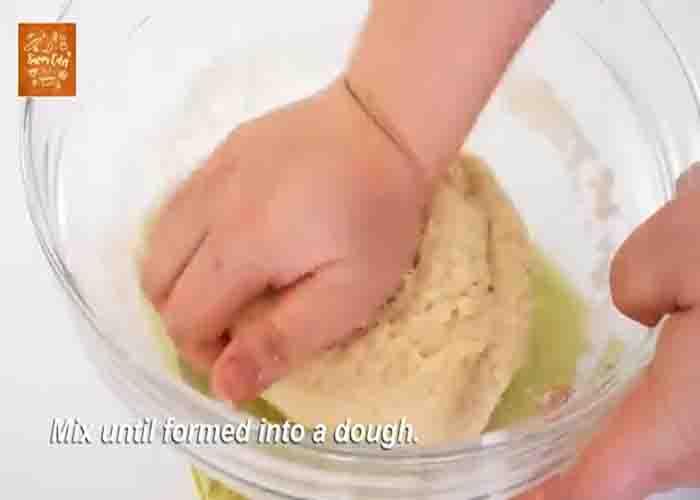 Kneading the dough for the cream cheese garlic buns