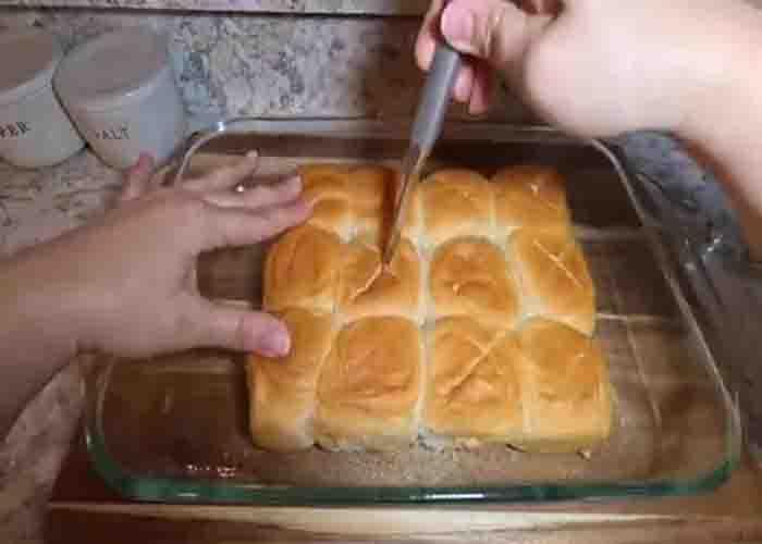 Slicing the top of the Hawaiian rolls