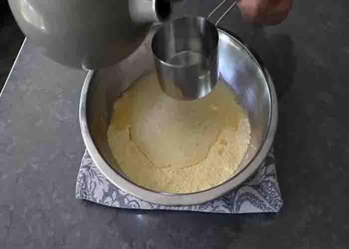 Making the hot water cornbread batter