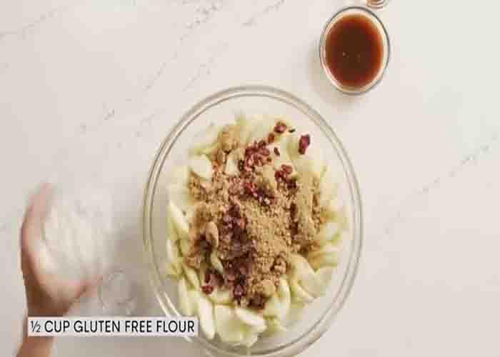 Mixing all the ingredients for the spiced chai apple crisp