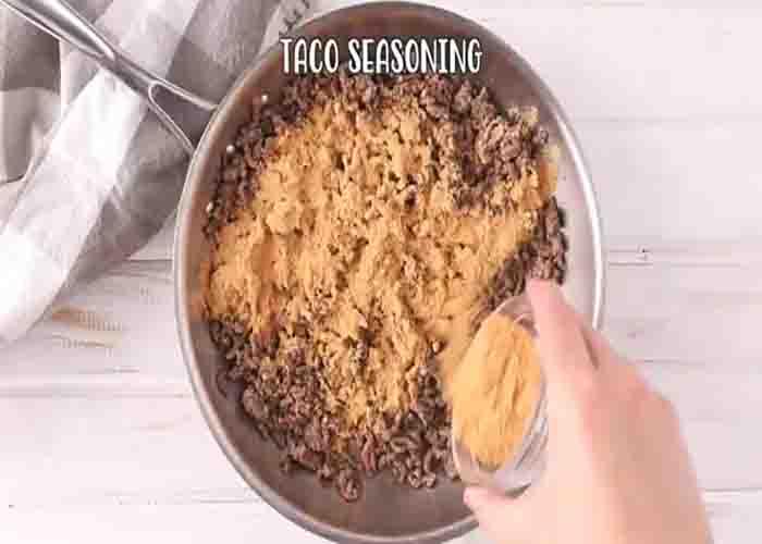 Cooking the ground beef for the smoked queso dip