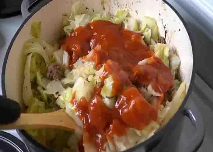 Cooking the smothered cabbage and ground beef