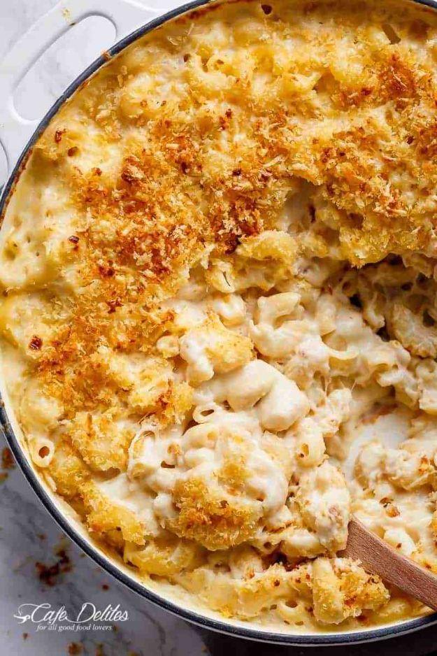 Creamy garlic parmesan mac and cheese in a wide pan under a browned, crisp panko and parmesan topping
