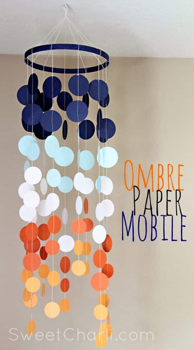 Typeset Ombre Paper Mobile title over a hanging mobile of sewn paper circles fading navy to orange on a hoop