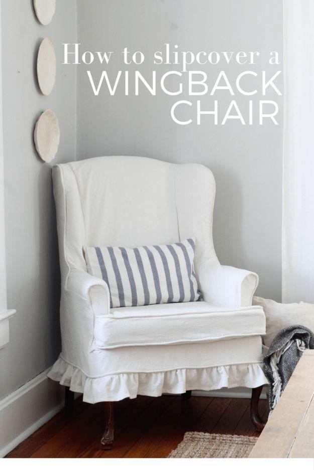 Wingback chair slipcover graphic showing a white drop cloth cover with a ruffled skirt and a striped pillow