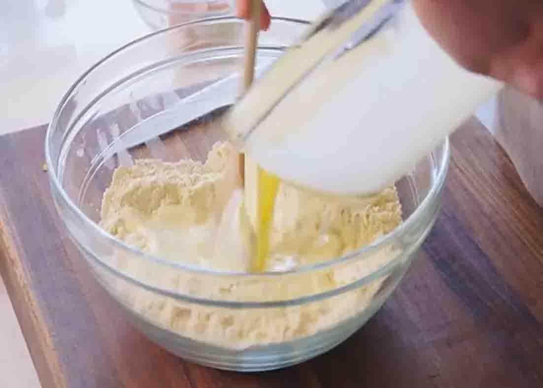 Mixing the ingredients for the cornbread muffins
