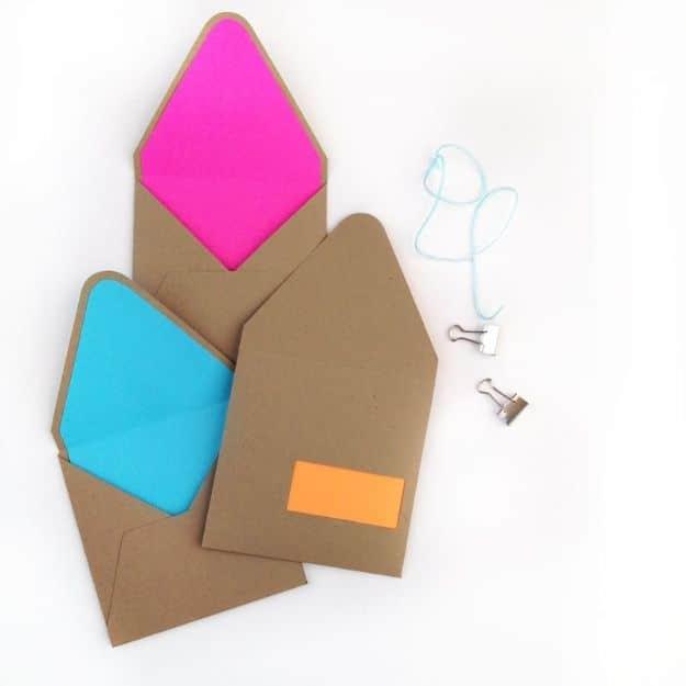 Create Your Own Envelope Cutouts, cheap to pull off with dollar store finds and a detail guests always ask about