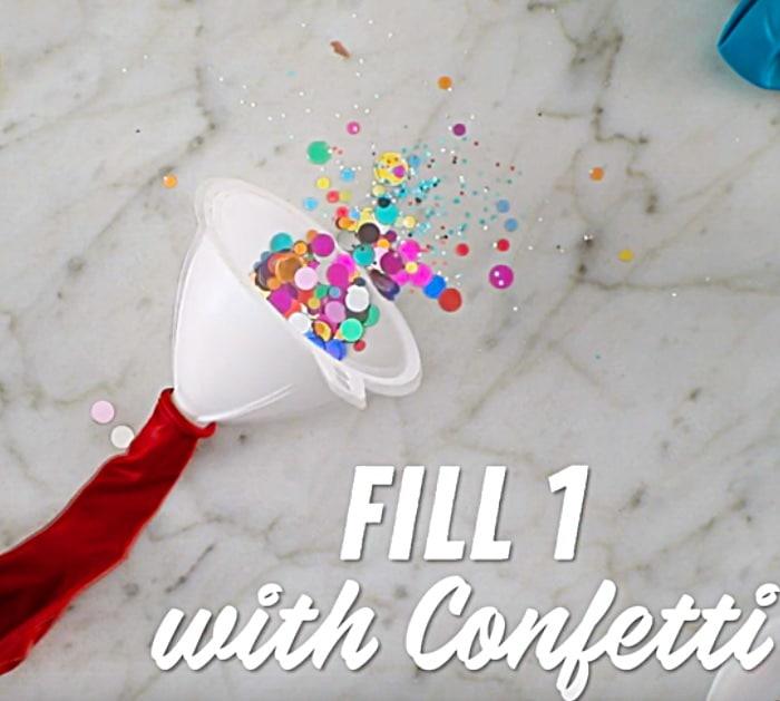 Make a confetti filled balloon clock for New Year's Eve