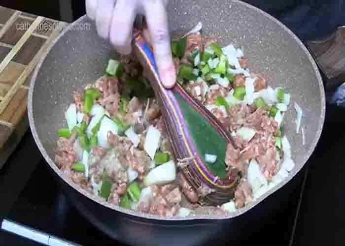 Cooking the meat for the spaghetti alfredo bake recipe
